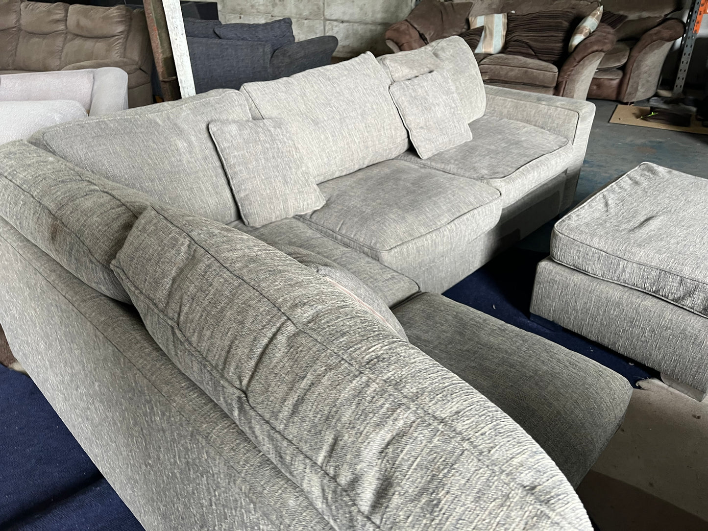Grey corner sofa with matching footstool