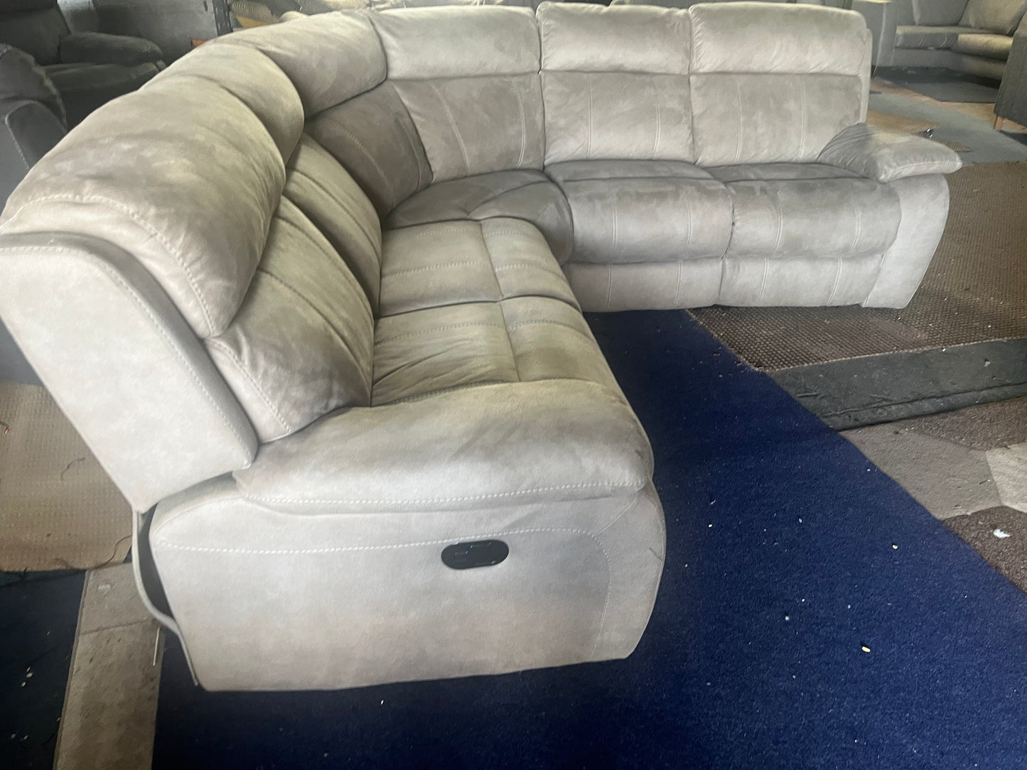 Large grey manual recliner corner sofa