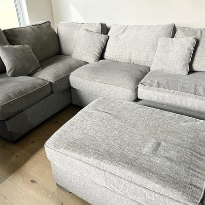 Grey corner sofa with matching footstool