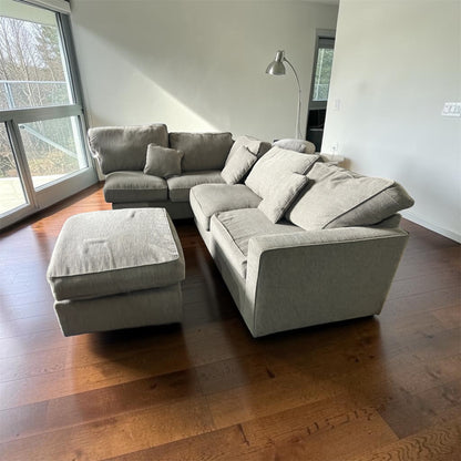 Grey corner sofa with matching footstool