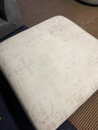 Large footstool with wooden legs