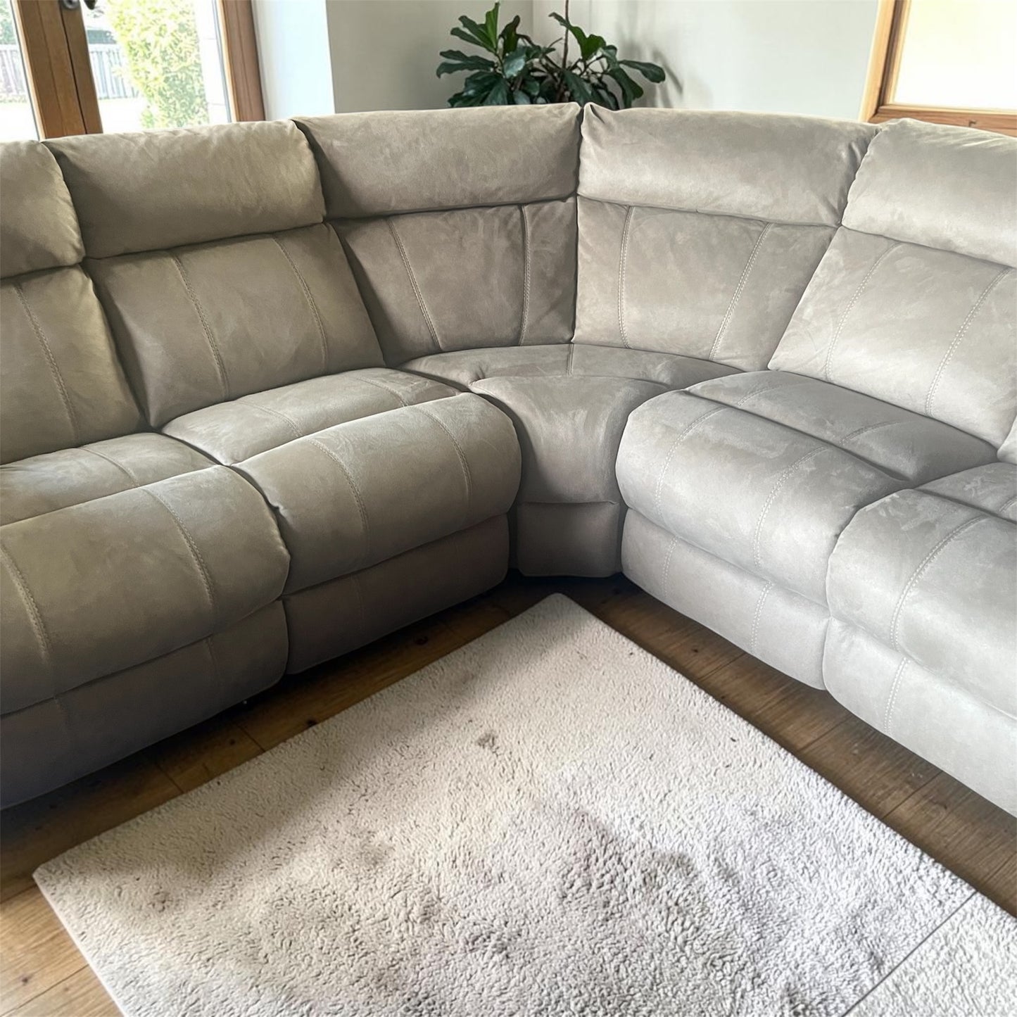 Large grey manual recliner corner sofa