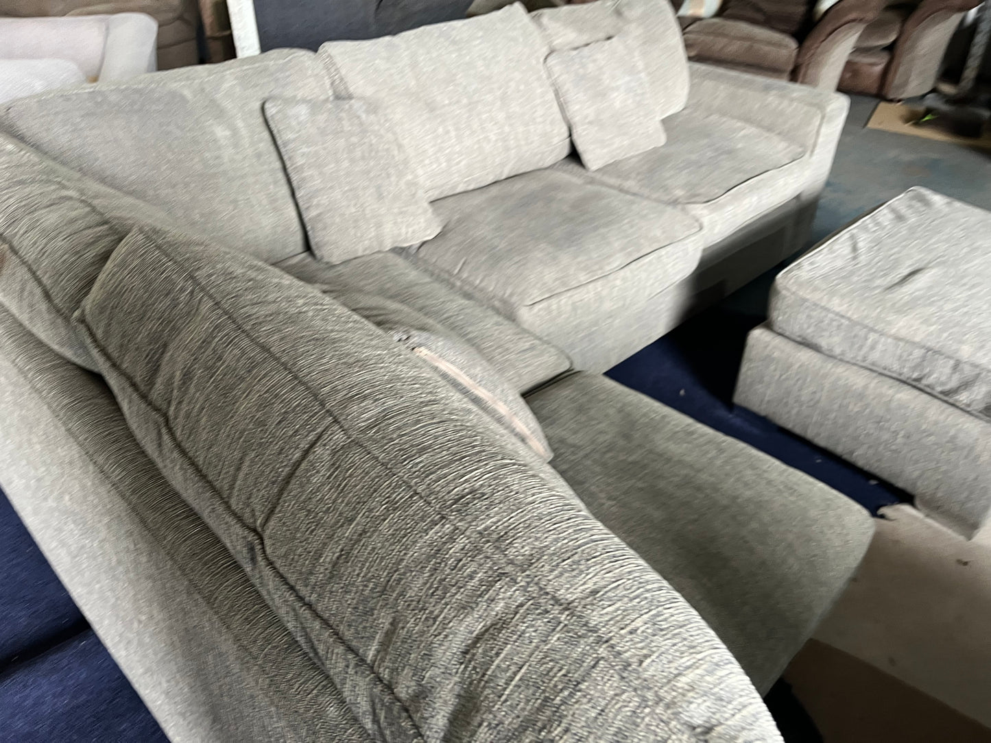Grey corner sofa with matching footstool