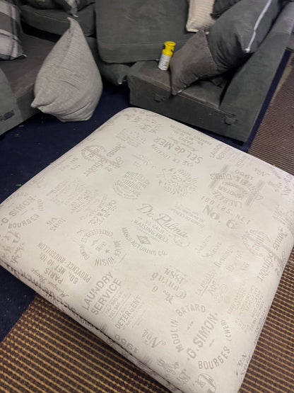 Large footstool with wooden legs