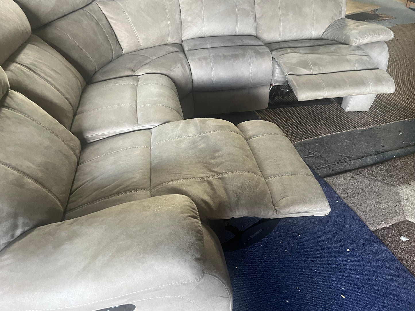 Large grey manual recliner corner sofa