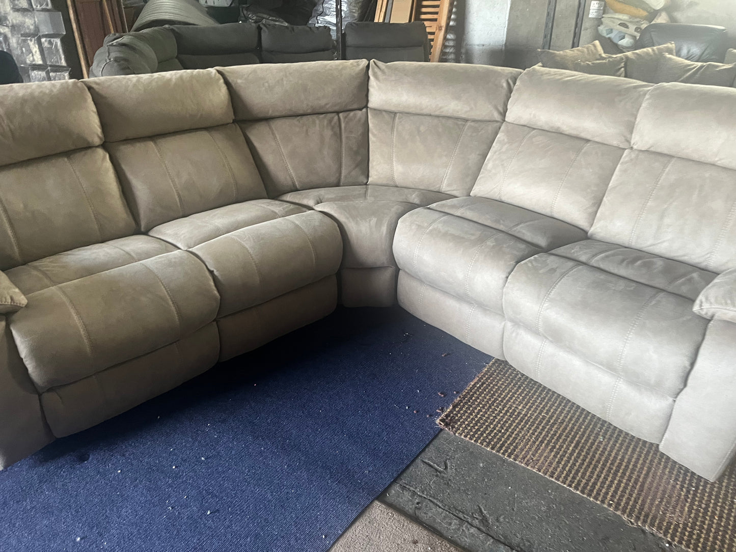 Large grey manual recliner corner sofa