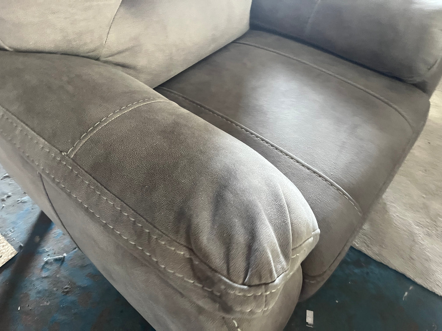 2 matching grey armchairs