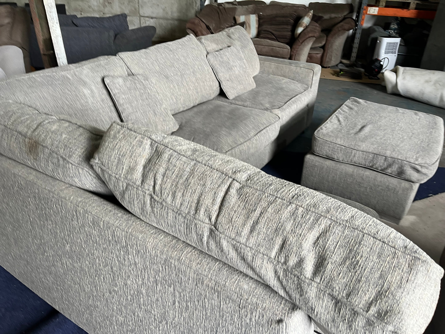 Grey corner sofa with matching footstool