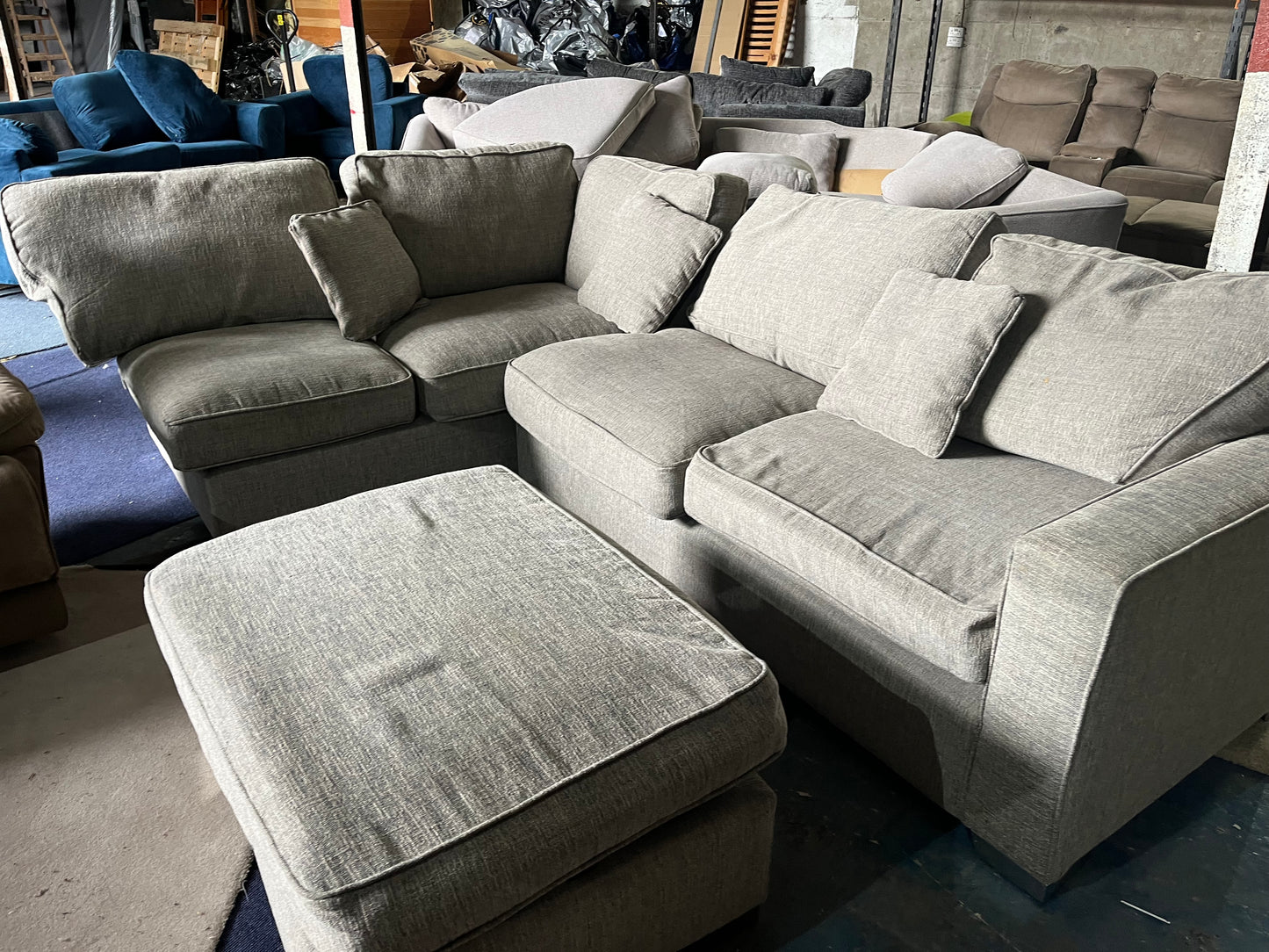 Grey corner sofa with matching footstool