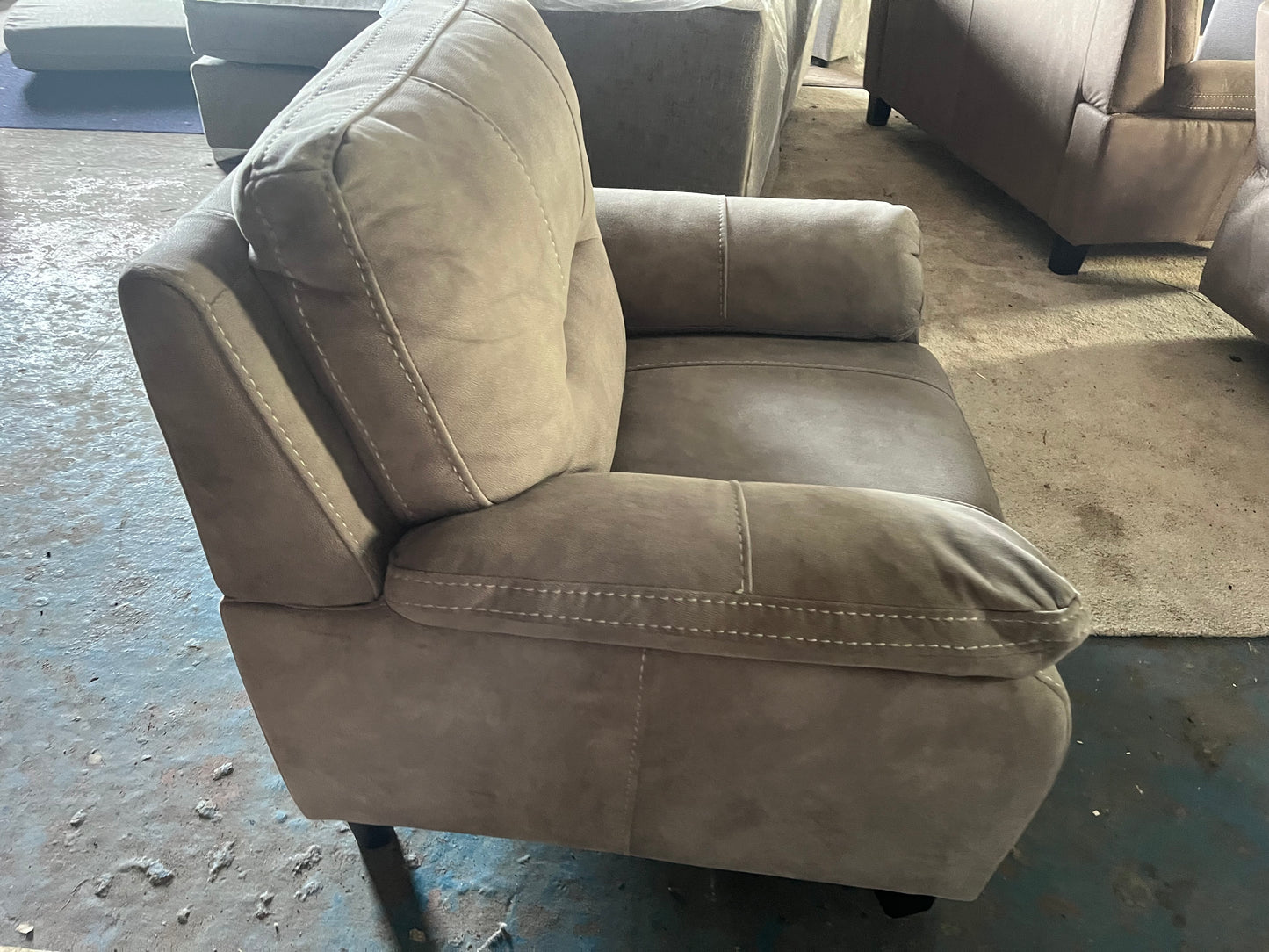 2 matching grey armchairs