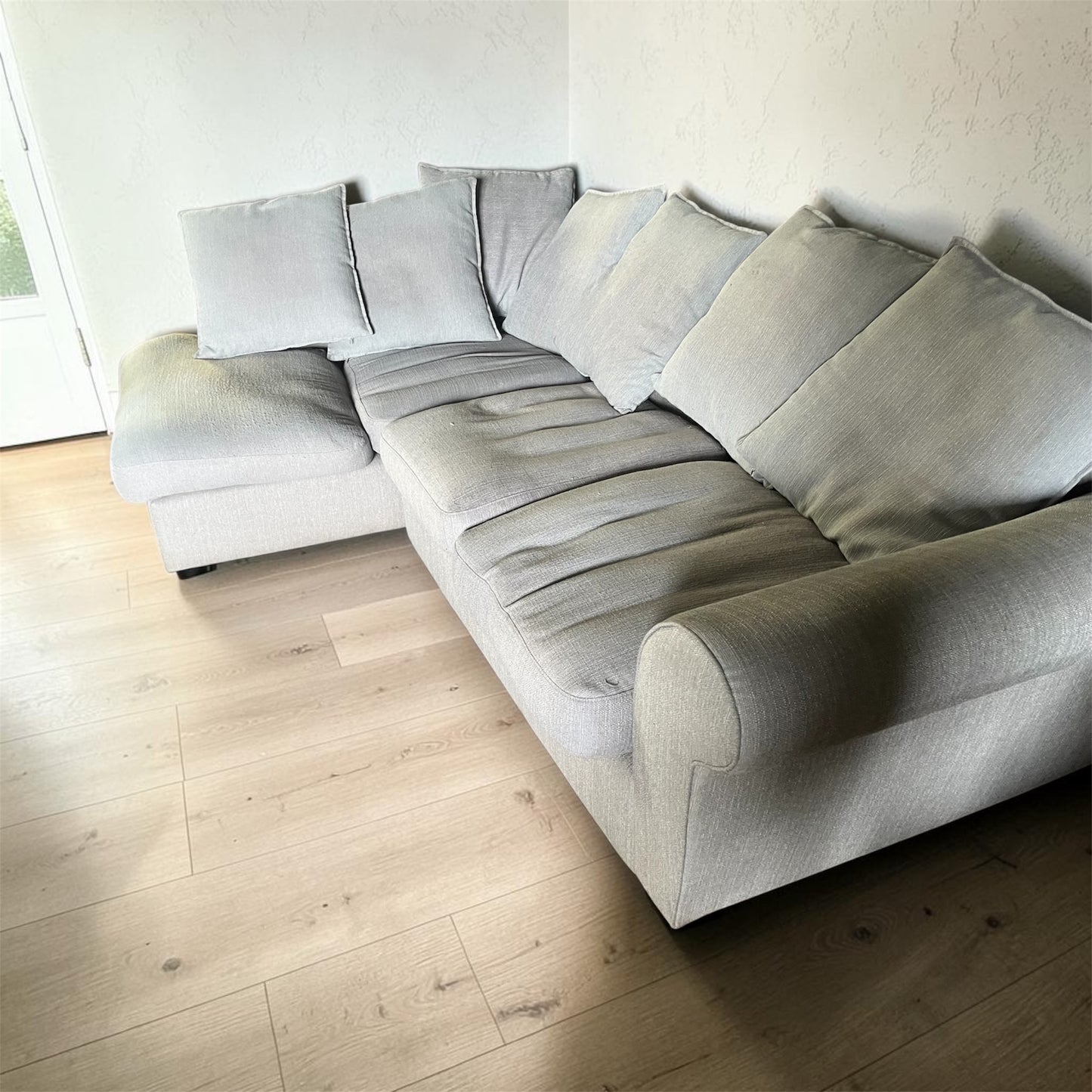 Grey corner sofa scatter cushions